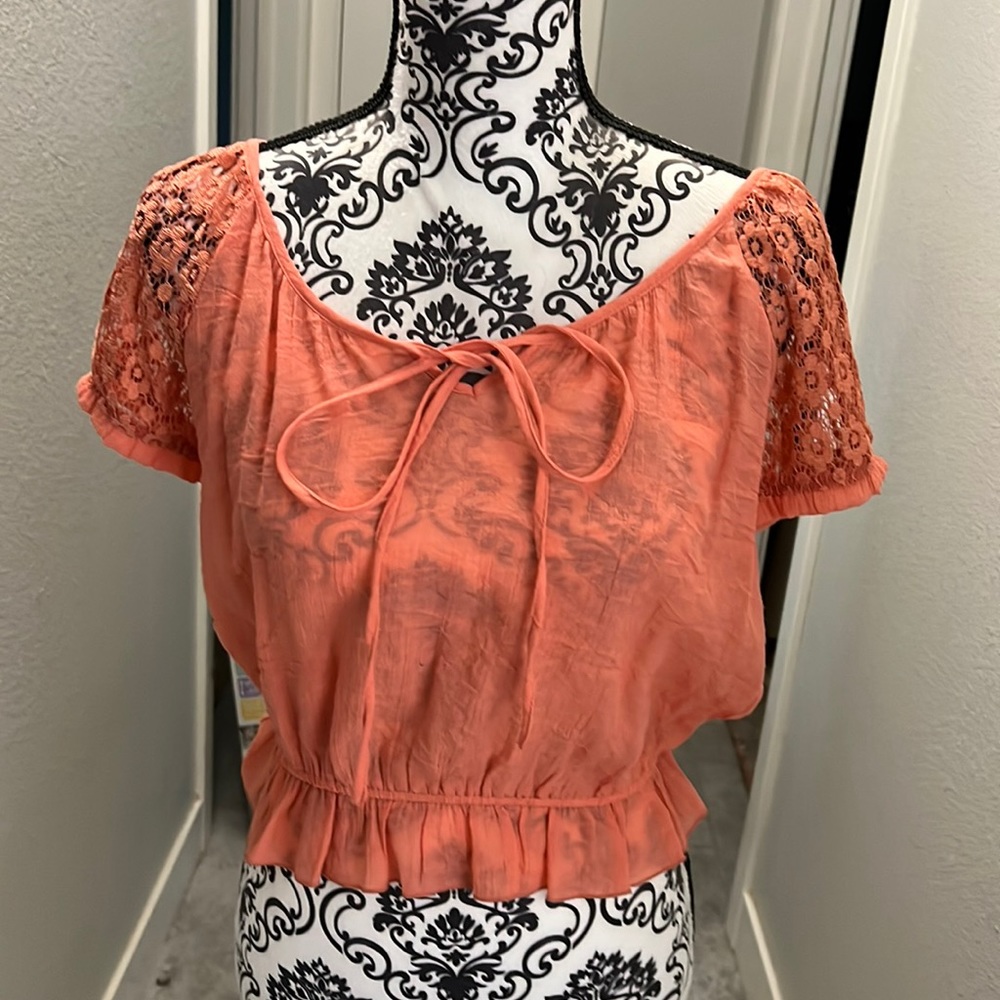 Orange top with sleeve detail